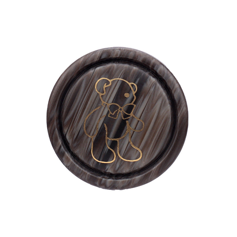 Round resin shank button, coffee brown with teddy bear line design