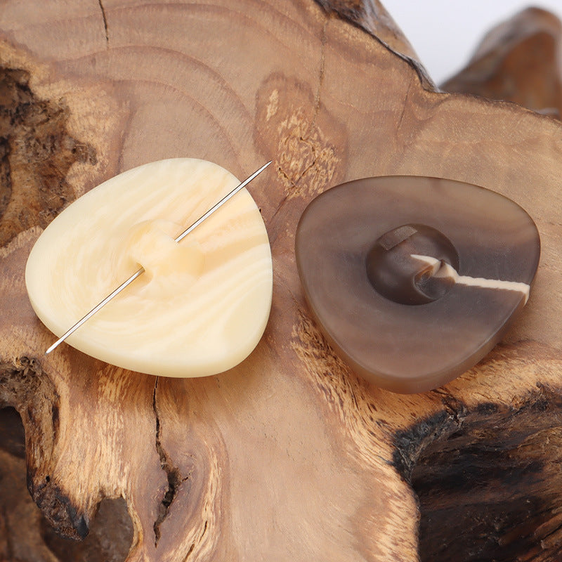 Rounded-triangle resin jacket buttons with shanks, beige and coffee colors