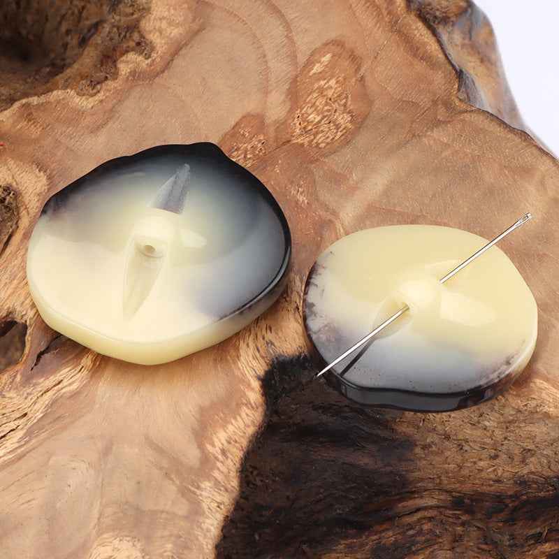 Shell-look resin buttons with shank posts, cream with gray-brown marbling, 2 pcs