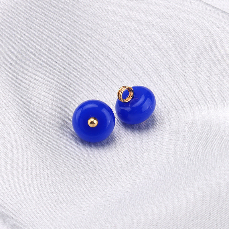 Two 10mm royal blue resin buttons with gold shanks