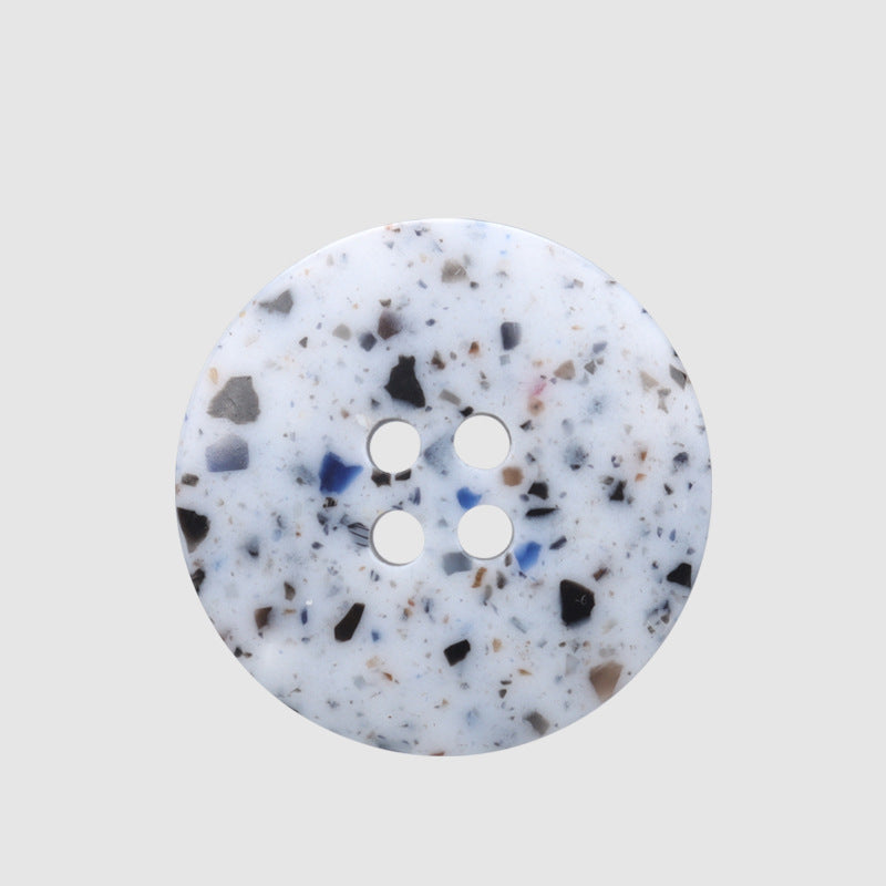 Round recycled resin button with speckled marble texture, 4 holes