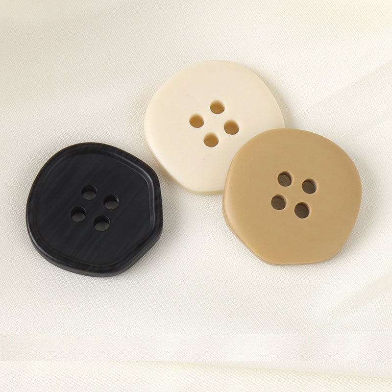 Assorted 4-hole resin buttons: black, cream and beige, woodgrain finish