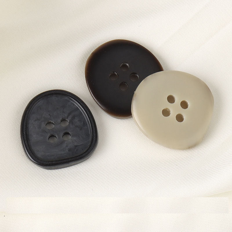 Assorted resin buttons in black, coffee brown, and beige, each with 4 holes