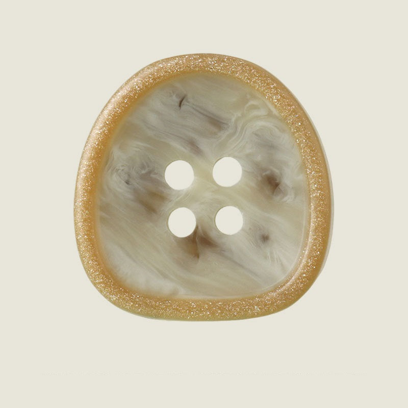 Beige resin button with marbled swirl and 4 holes, gold-speckled rim