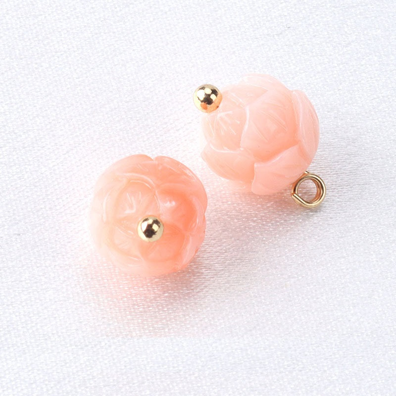 Pale pink resin flower bead buttons with gold studs and ring loop