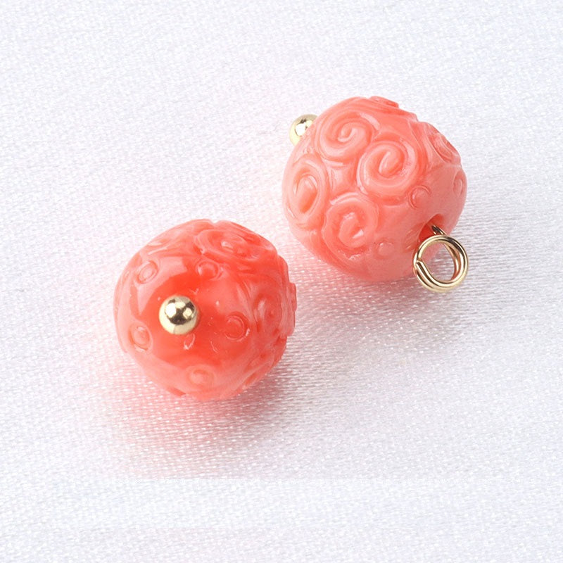 Coral-pink resin flower bead buttons with gold studs and ring loop