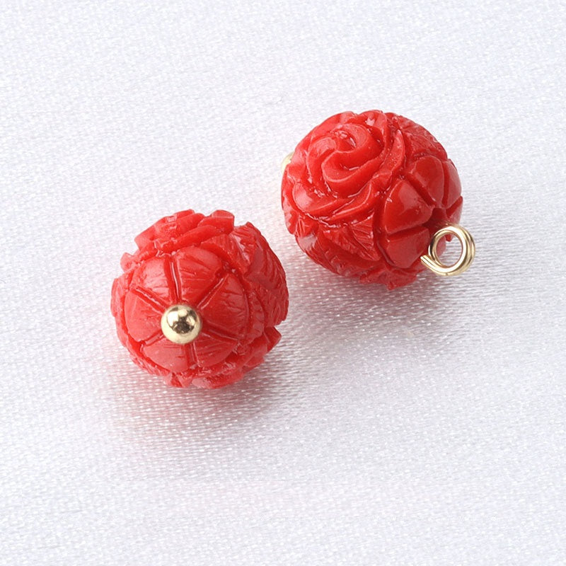 Red-pink resin flower bead buttons with gold studs and ring loop pair