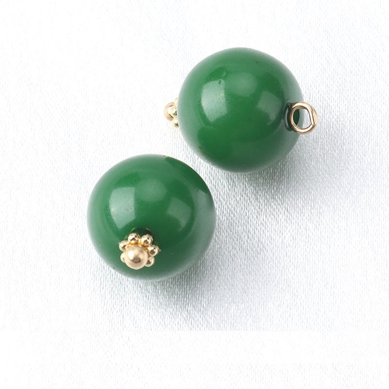 Green resin bead buttons with flower base, gold-tone loop backs
