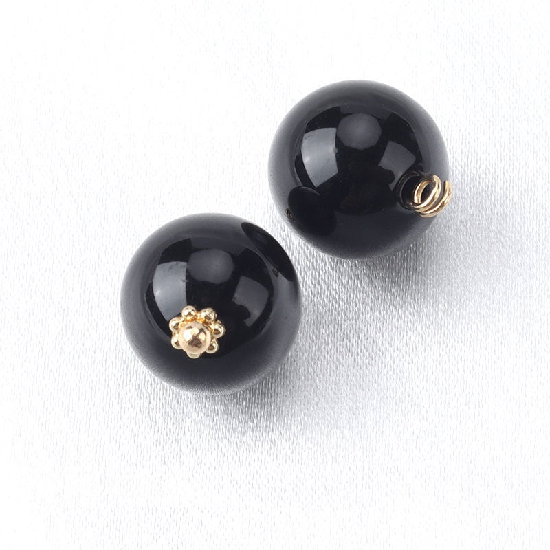 Black resin bead buttons with flower base, gold-tone loop backs