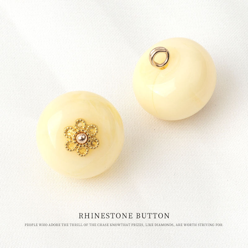 Yellow resin bead frog button with gold floral base, small rhinestone center, loop detail