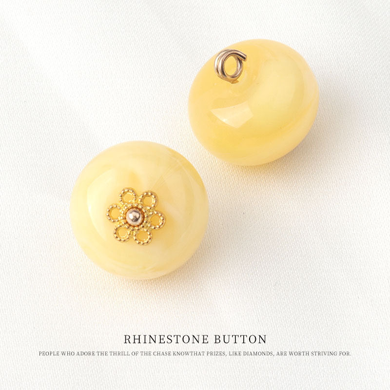 Yellow resin bead frog button, looped back and gold flower embellishment with center stone