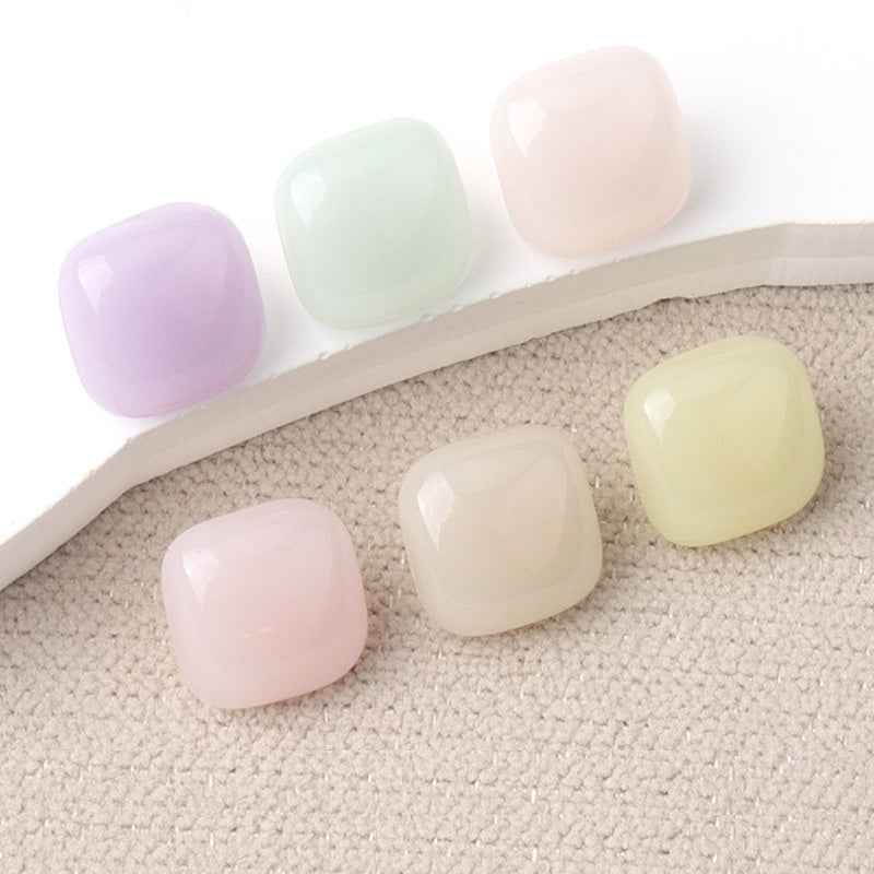 Pastel square resin buttons, lavender and pale green—gold-tone shanks