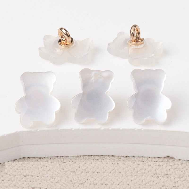 Weiße Bärenknöpfe aus Resin mit goldfarbener Öse, 12mm, 6er Ansicht