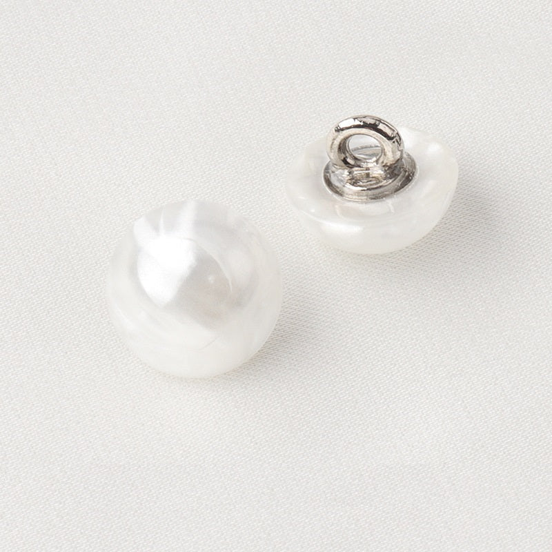 White resin shirt button with metal shank, glossy domed mushroom style