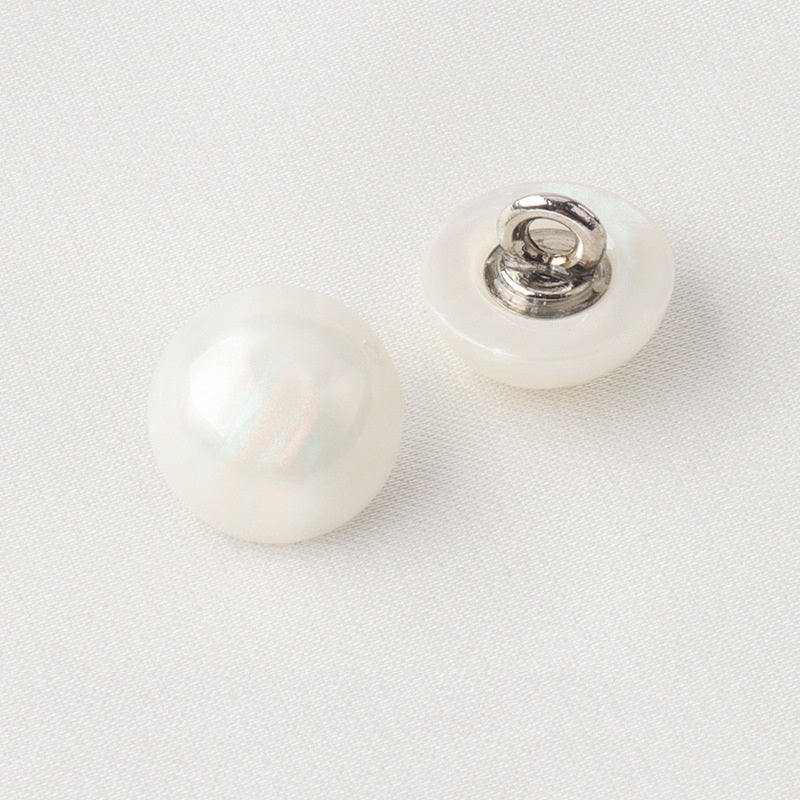 White resin shirt buttons with silver metal shanks, translucent mushroom style