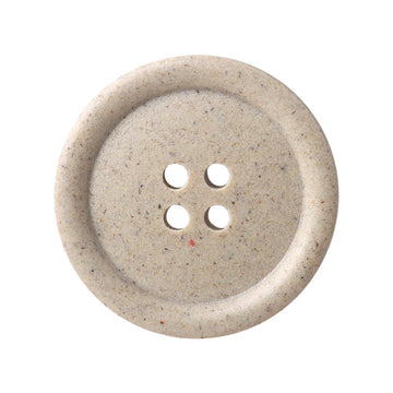 Round four-hole buttons, frosted beige resin, close-up of button face