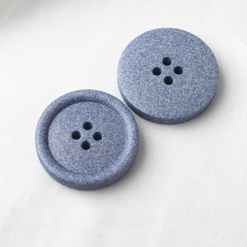 Round four-hole buttons, frosted light blue resin, two button faces