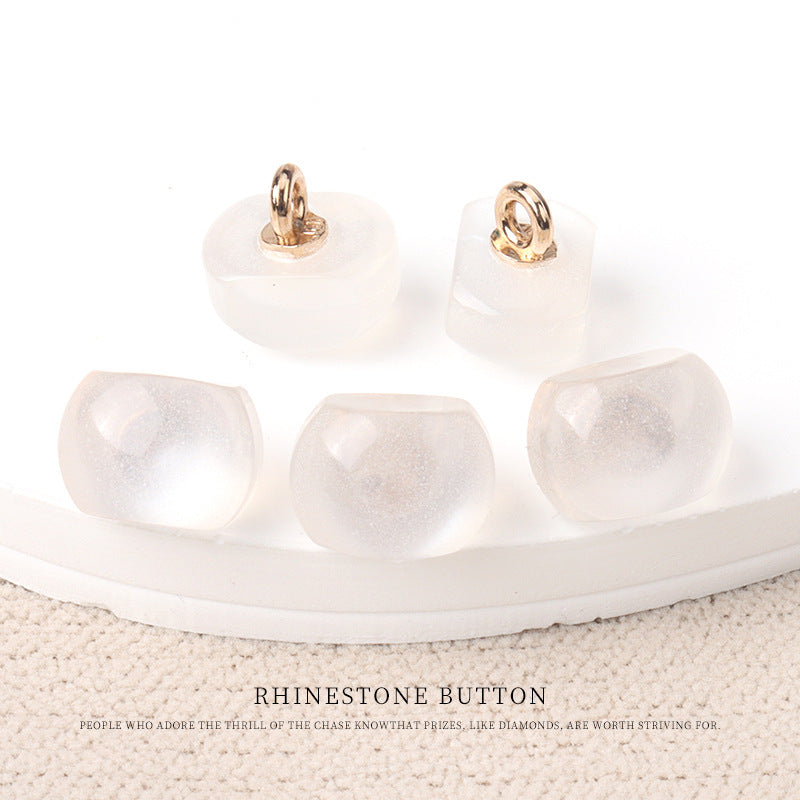 Clear/translucent resin pearl buttons with gold metal shanks, 10mm