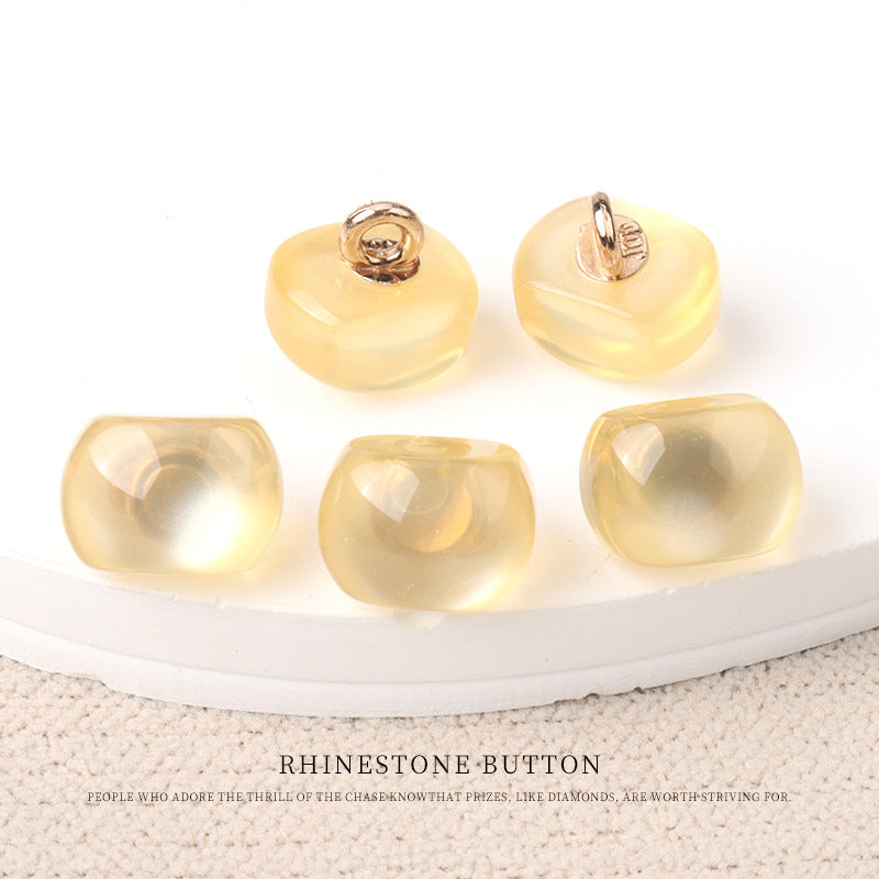 Yellow resin pearl buttons with gold metal shanks, 10mm