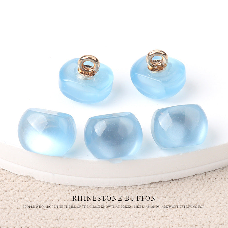 Light blue resin pearl buttons with gold metal shanks, 10mm