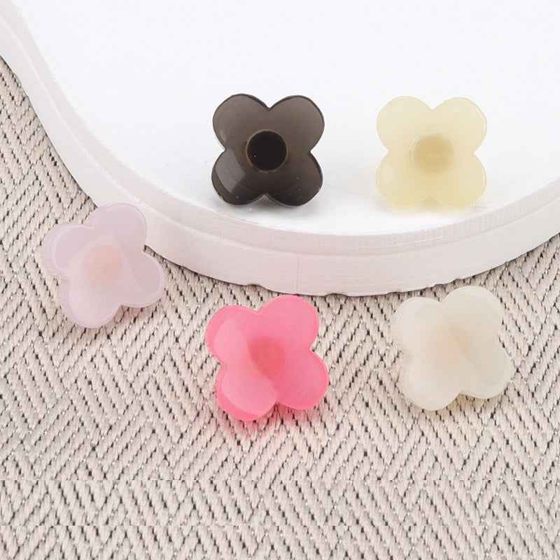 Flower-shaped resin buttons with high shank, dark brown, 5-petal design