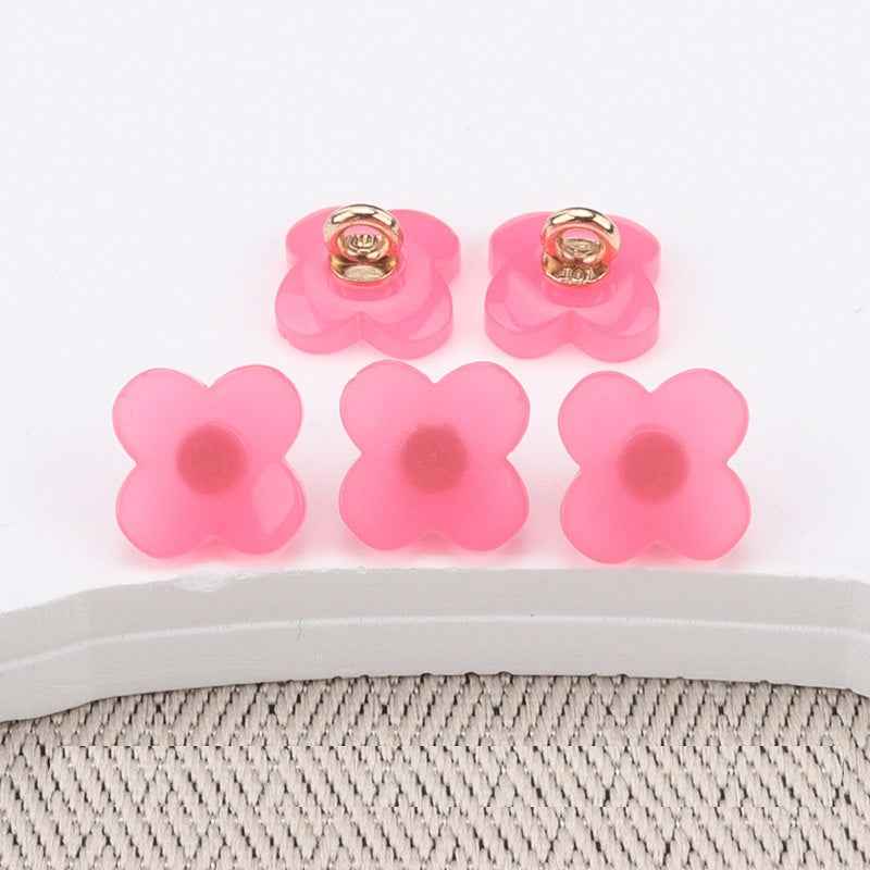Flower-shaped resin buttons with high shank, bright pink, gold-tone sewing tops