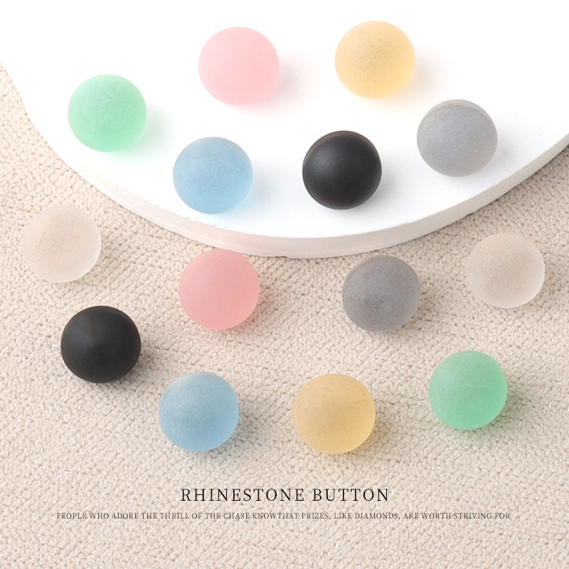 Small round matte resin buttons in assorted colors: mint, pink, yellow, gray, black—metal shank.