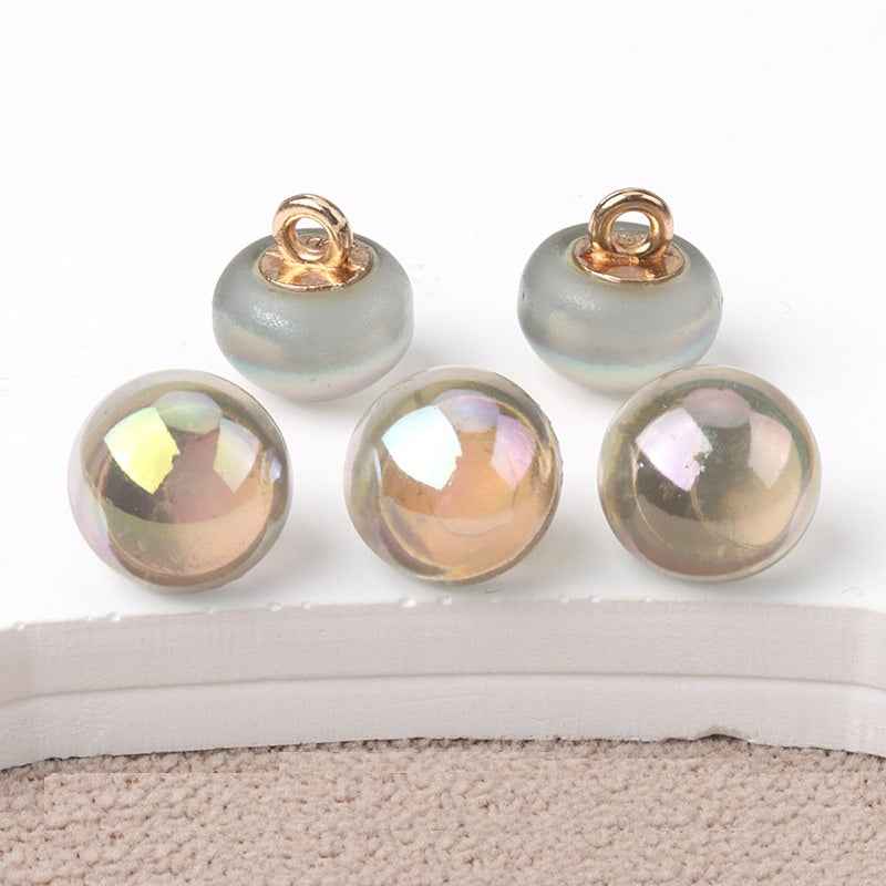 10mm resin mushroom buttons, gray opal shades with iridescent centers and gold-tone loops
