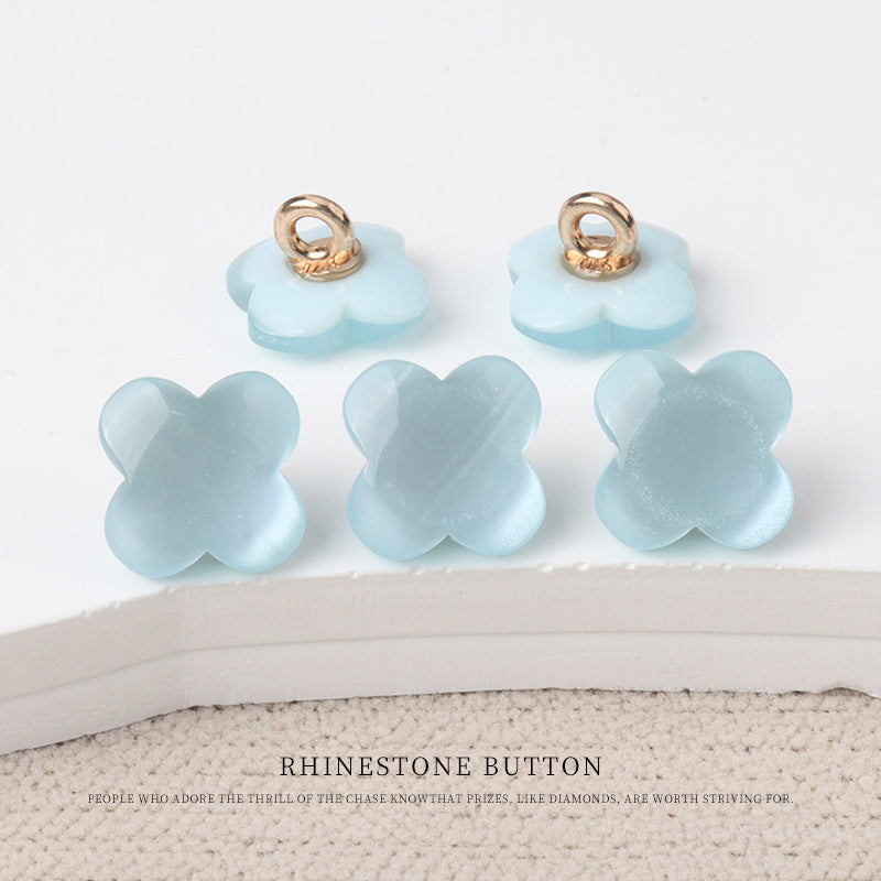 Light blue flower-shaped resin shank buttons for children's sweaters with metal shank loops