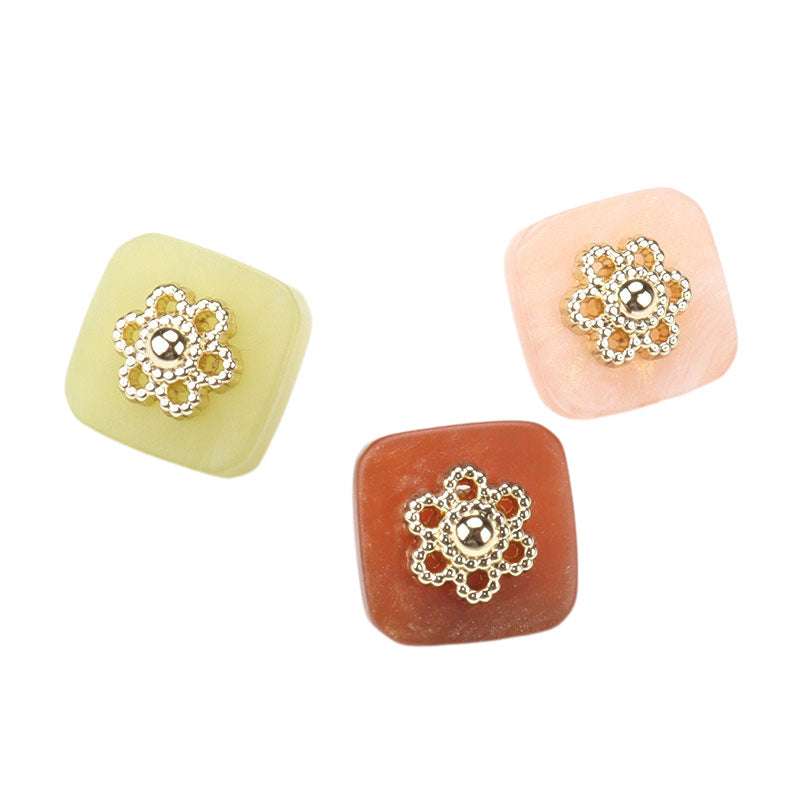 Square resin buttons with metal shanks, ornate silver center; green, pink, brown.