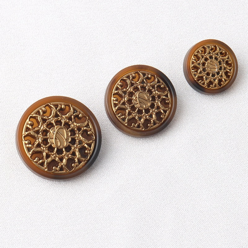 Coffee resin shank buttons with gold ornate floral front, three buttons