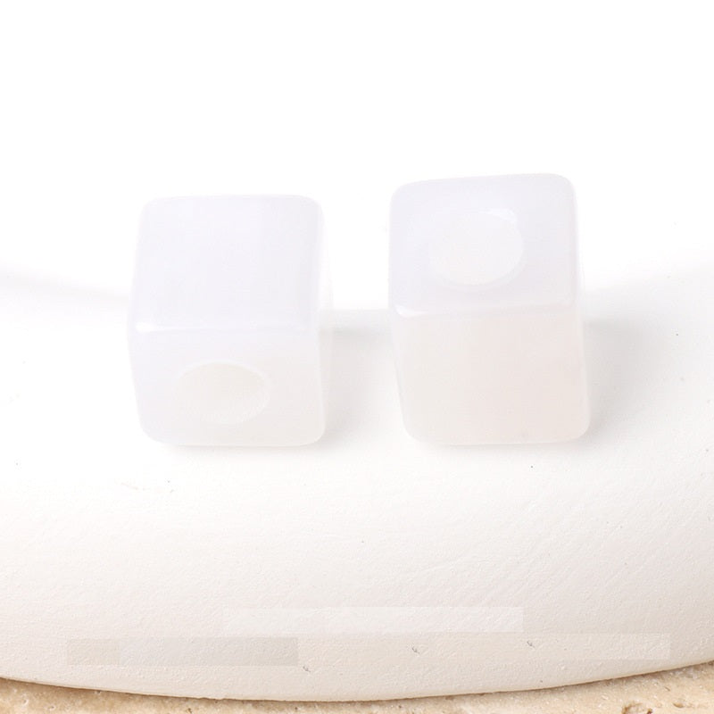 White square beaded buttons with round holes, set for handmade DIY accessories