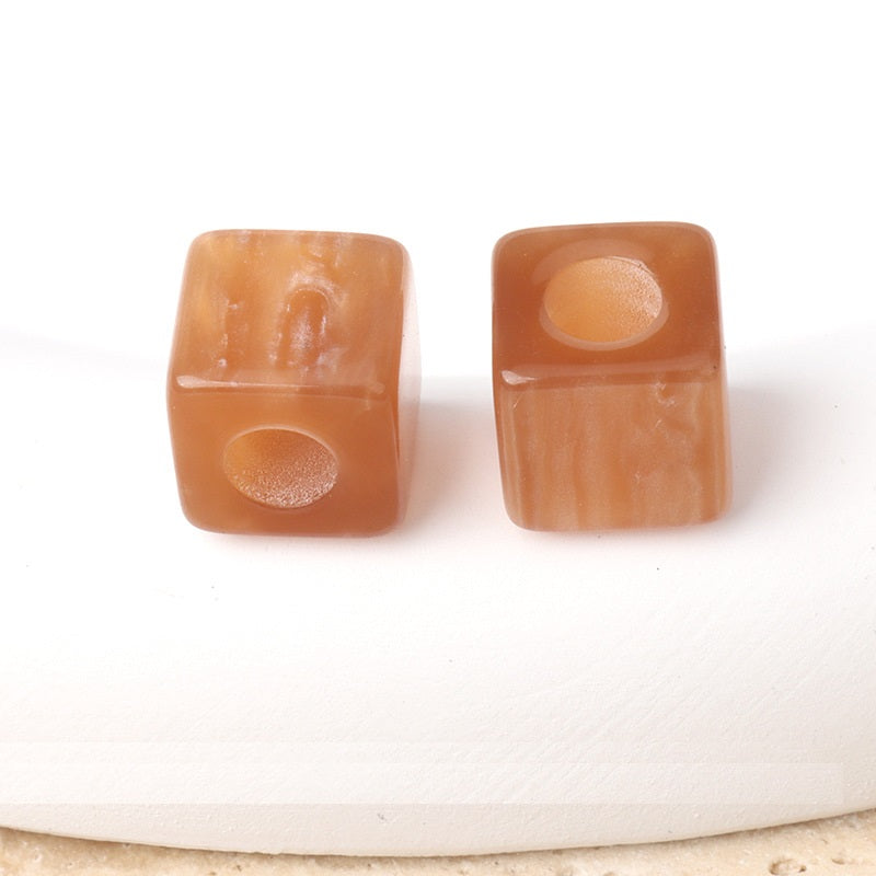 Orange/amber square beaded buttons with round holes for handmade accessories