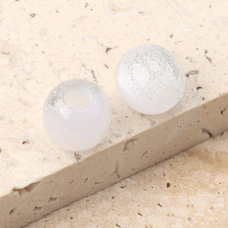 12mm resin beads with pearl luster, white and speckled white-gray with center hole