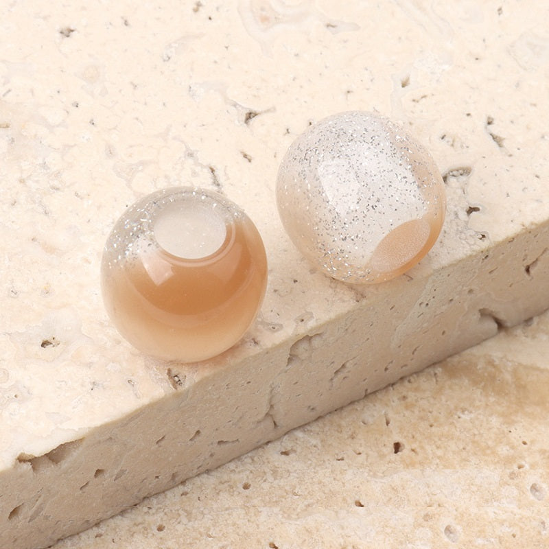 12mm resin beads, peach translucent with pearl luster and drilled hole