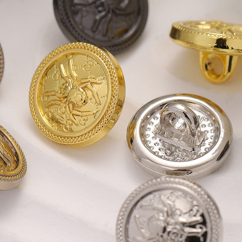 High-foot spider web buttons showing underside posts and shank, gold and silver round backs