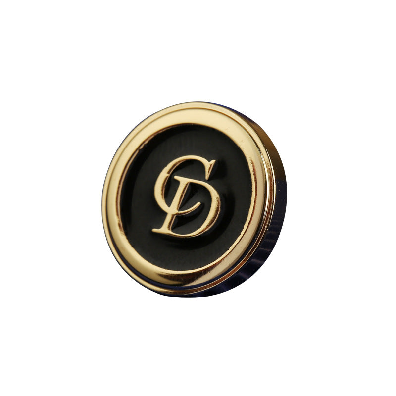 Round letter CD clothing button, gold-tone metal with black center