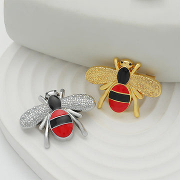 Gold and silver cartoon bee enamel brooches, red-and-black stripes, 2-pack.