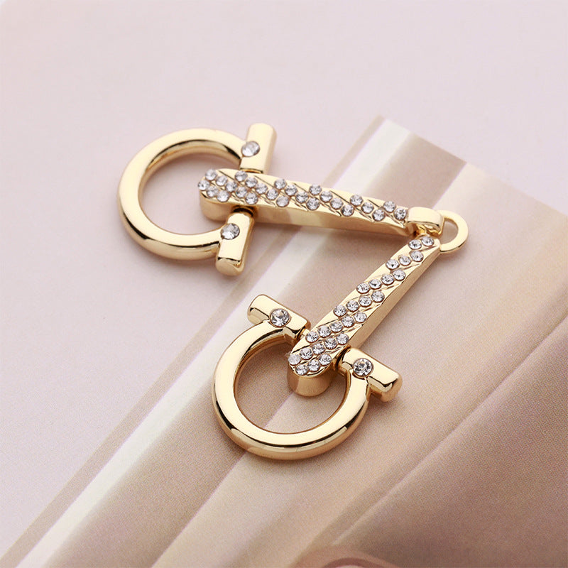 Heart buckle pair with gold-tone finish and crystal rhinestones, slim belt hardware