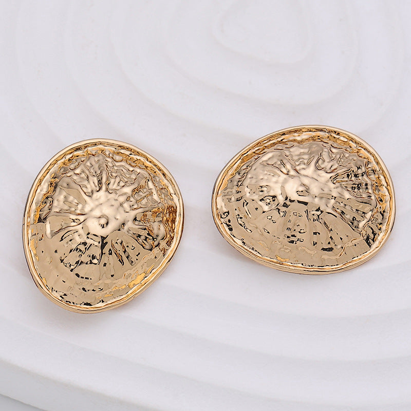 Pair of 22mm rose gold convex clam-shell metal buttons, hammered texture