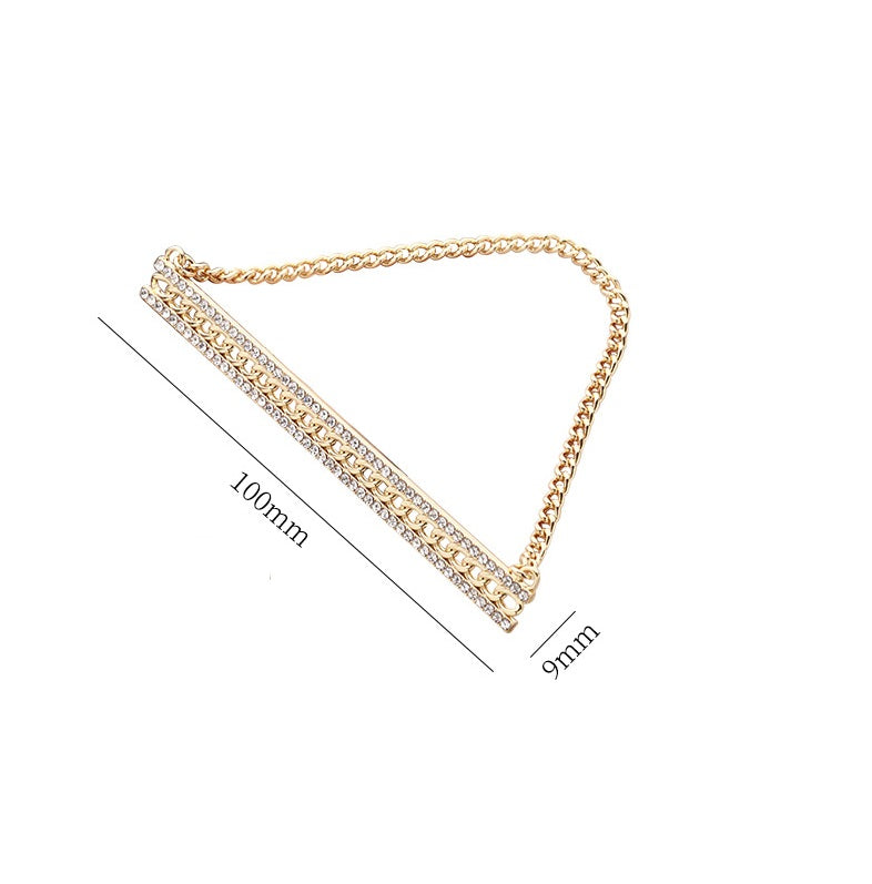 Goldfarbene Brosche mit Strass-Steinstreifen, Maße 100 mm x 9 mm