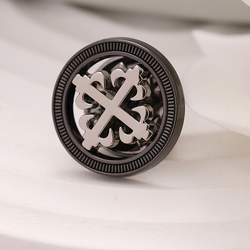 Set of 10 black hollow cross metal brooches, textured rim, front view