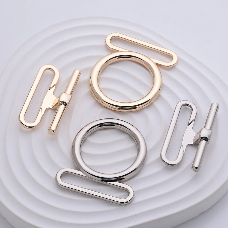4 belt lock buckles set in rose gold and silver metal