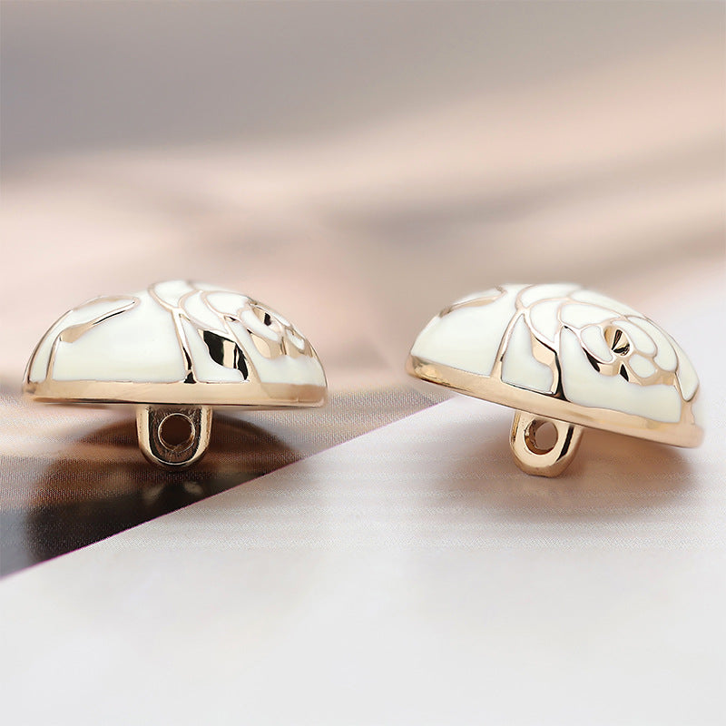 White camellia textured metal buttons, mushroom shape, two-piece view with shank backs