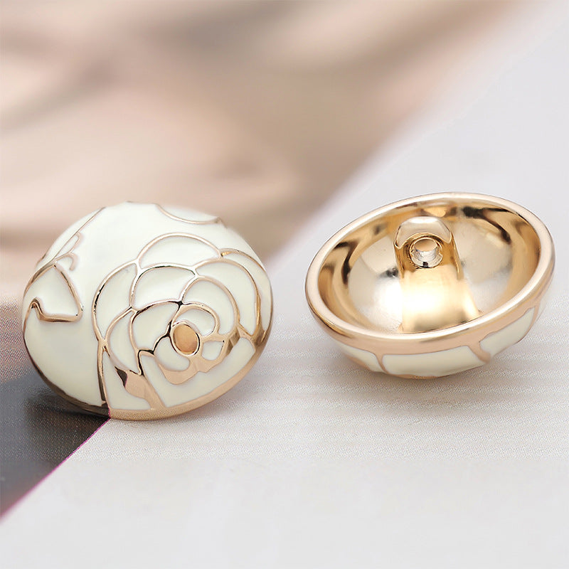 White camellia metal buttons, mushroom shape, back view with metal loop shank