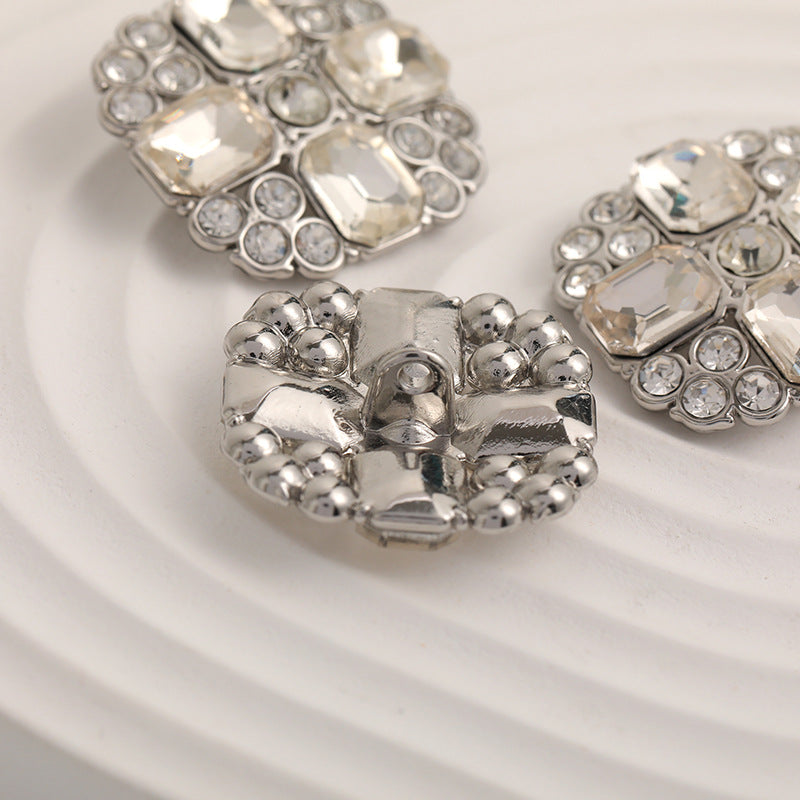 Silver metal crystal diamond buttons, close-up of several pieces from the set