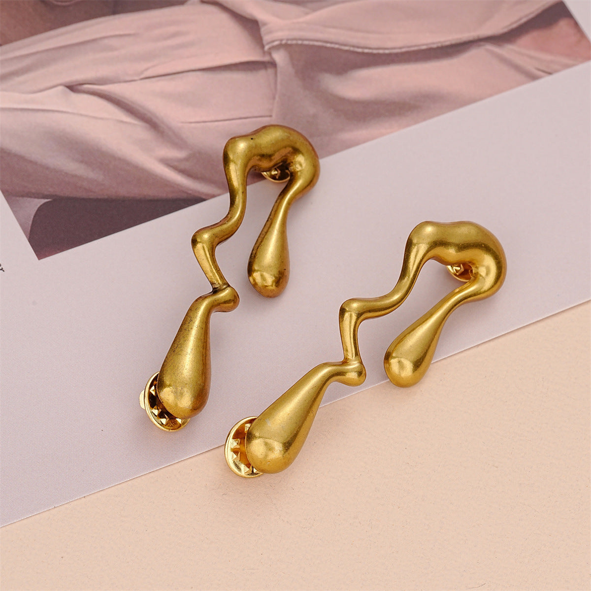 Golden irregular teardrop buckle pair with prong/spring clasp, 2 pieces