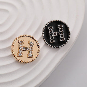 Set de botones redondos con letra H, pedrería, color dorado y negro (8 piezas)