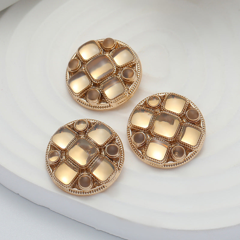 Set of rose gold metal shank coat buttons, three round fronts with square insets