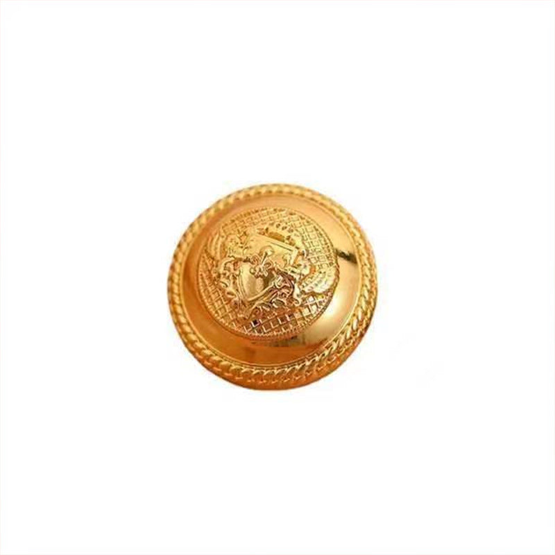 Vintage gold metal button with double lion emblem and ornate rim, front view